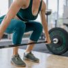 Femme adulte faisant de la musculation et pouvant ressentir un coregasm